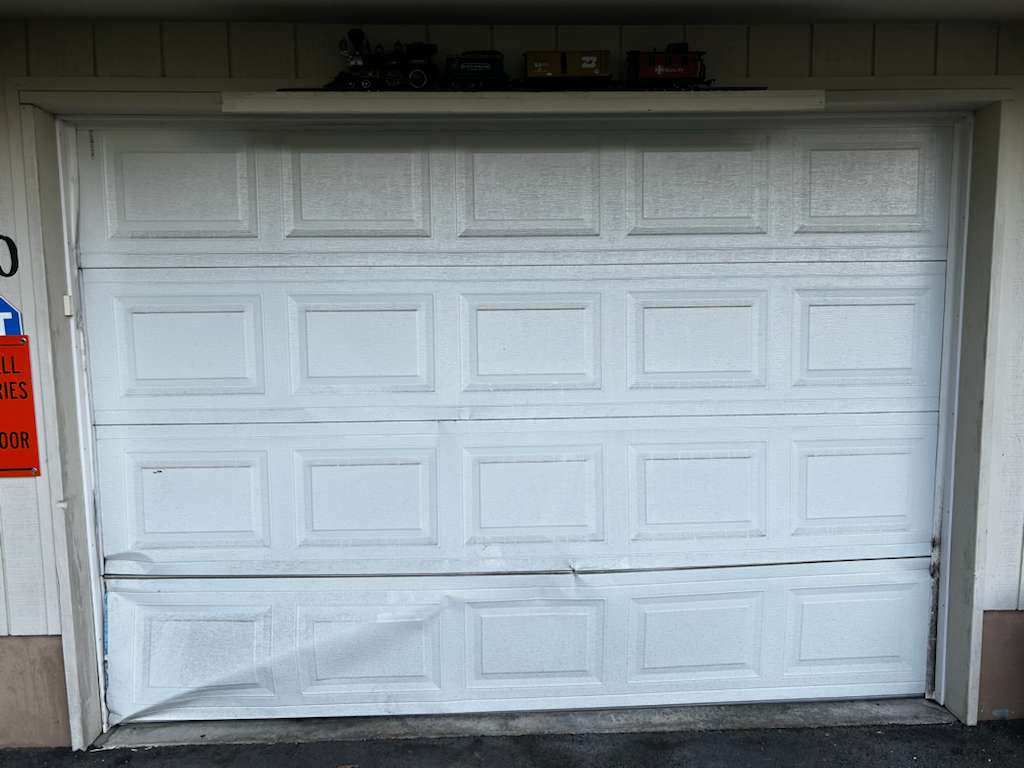 emergency garage door repair Salem OR technician responding to stuck door